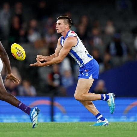 Image of Colby McKercher Passing Ball On Field